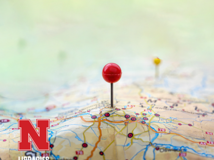 map pin in a paper map